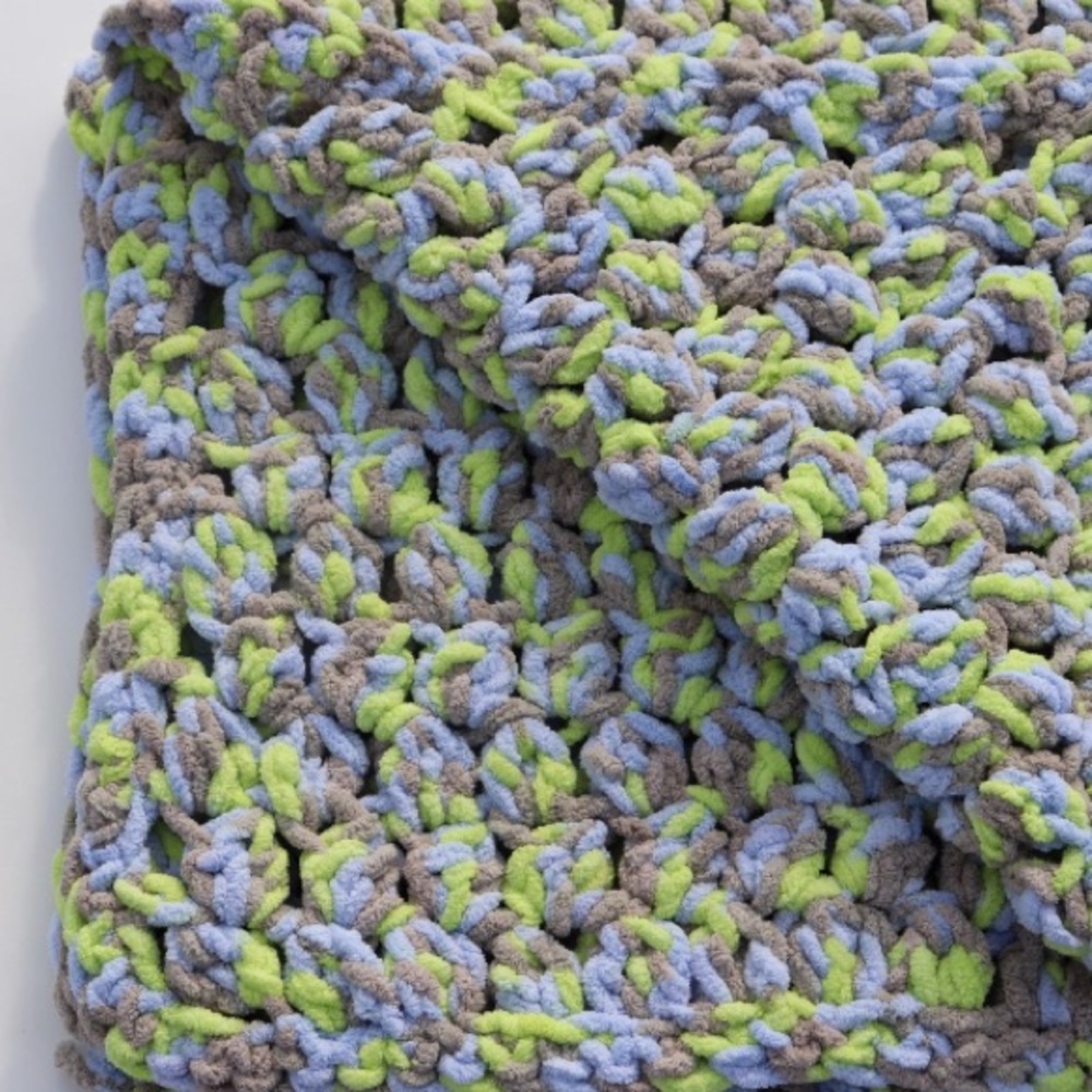 Crochet baby blanket. Blue, gray, green colored yarn. Machine washable/air dry.